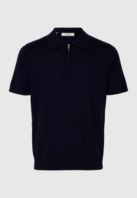 Polo bleu marine à manches courtes avec une fermeture éclair à l'avant et un col classique, fabriqué en tissu léger.