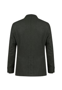Blazer verde scuro con motivo a spina di pesce; con uno spacco singolo, revers a scialle e polsini con bottone. Vestibilità sartoriale con tessuto testurizzato.