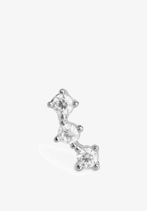 Drei verbundene, runde, klare Steine in einem Design aus silberfarbigem Metall, das eine geschwungene Form aufweist und durch kleine Krappenfassungen betont wird.