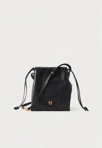 Black leather bucket bag with adjustable straps, gold hardware, a drawstring closure, and a subtle logo accent on the front.