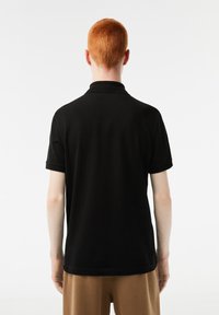 Lacoste Piké - black