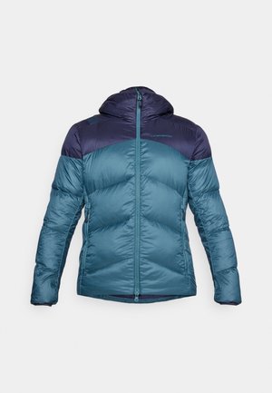 Blue puffer jacket with a hood, featuring a dark blue upper panel, zip closure, quilted texture, and elastic cuffs.