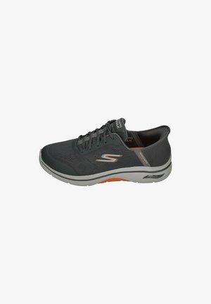 Gray athletic shoe with a breathable mesh upper, lace-up design, cushioned sole, and orange accents on the midsole.