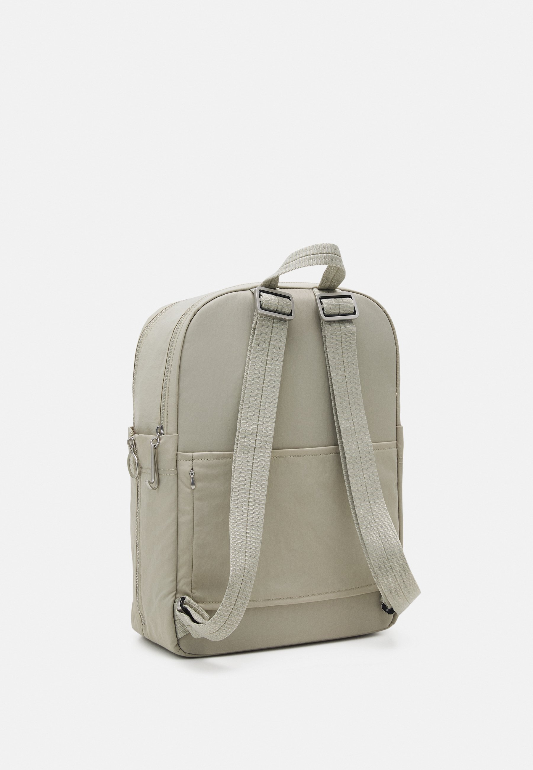 beige nike backpack