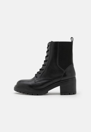 DAMIANA - Botines con plataforma - black