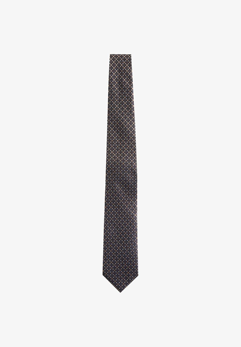 Cravate bleu marine avec un motif répétitif de petites formes géométriques beiges et bleu clair.