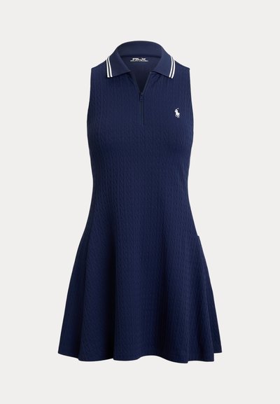 Ναυτικό αμάνικο φόρεμα με υφασμάτινο σχέδιο πλεκτού καλωδίου, γιακά με φερμουάρ και λευκές ρίγες, με χαλαρή γραμμή Α-σχήματος.