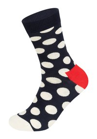 Marineblaue Socken mit weißen ovalen Mustern, roten Akzenten an der Ferse, geripptem Bündchen und einer glatten Textur. Material aus Baumwollmischung.