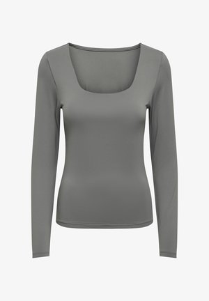 Top de manga larga en gris suave, con un escote cuadrado y una textura lisa. Diseño simple con una silueta ajustada.