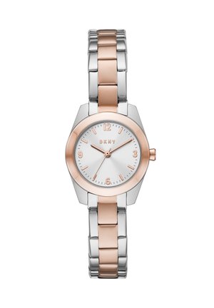 DKNY silver and rose gold watch features a round face, white dial, and numeral hour markers. The band alternates between metal links.