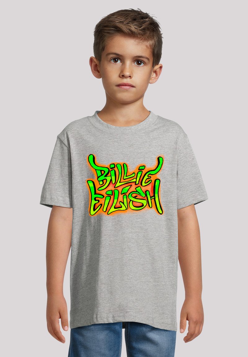 Gray cotton t-shirt with short sleeves featuring colorful "Billie Eilish" graphic in yellow and green with an orange gradient background.