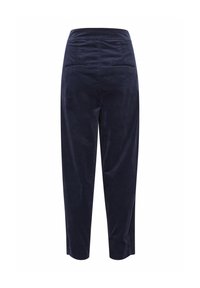 Pantaloni in corduroy blu scuro con una vita alta, dotati di due tasche posteriori e una vestibilità ampia che si restringe alla caviglia. Texture liscia.