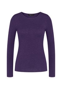 Chemise ajustée pour femme, à manches longues, de couleur violette, avec un col rond, présentée de face sur fond blanc.