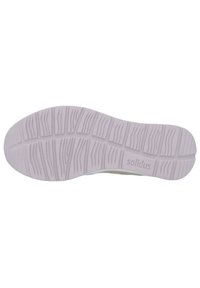 Shoe sole in light pink with a textured, ridged pattern. Embossed branding "solidus" near the heel for identification.