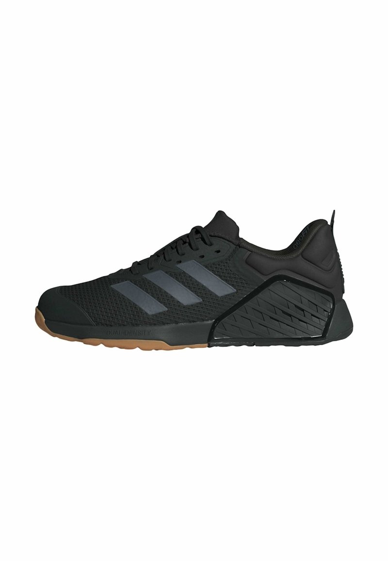Black athletic shoes with a mesh upper, featuring three reflective stripes, a textured heel, and a gum rubber sole for traction.