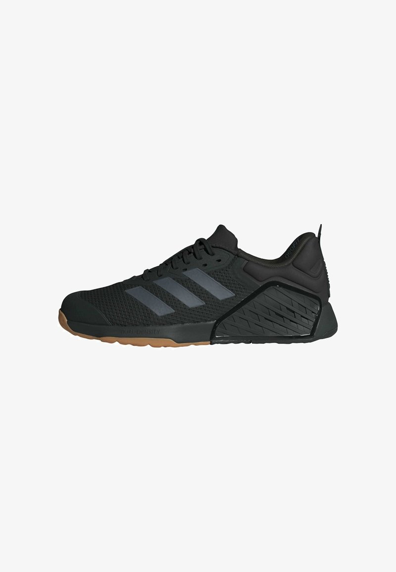 Black athletic shoes with a mesh upper, featuring three reflective stripes, a textured heel, and a gum rubber sole for traction.
