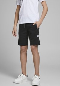 Jack & Jones Junior JJIAIR - Teplákové kalhoty - black
