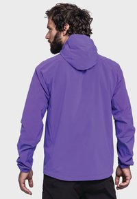 Lila wasserdichte Jacke mit Kapuze, ausgestattet mit einer glatten Textur und elastischen Bündchen, entworfen für Outdoor-Aktivitäten.