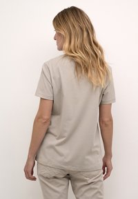 Cream VELIE   - Apdrukāts T-krekls - blush watercolor confidence