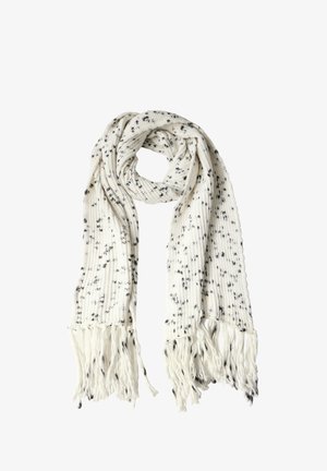 Neulehuivi vaaleassa kermassa, jossa on mustia pilkkuja, pitkät röyhelöt kummassakin päässä ja ribbitekstuuria koko matkalla.