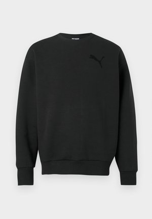 Sort langærmet crewneck-sweatshirt med ribbede ærmekanter og kant, med en subtil sort Puma-logo på venstre bryst.
