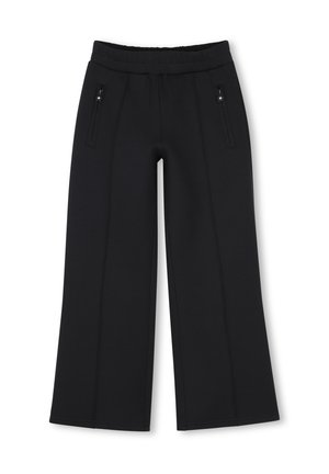 Pantalon noir à jambes larges avec ceinture élastique et deux poches zippées verticales sur les côtés avant.