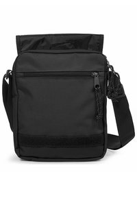 Borsa a tracolla nera in tessuto, con tasca frontale con zip, tracolla regolabile e dettaglio in velcro. Materiale impermeabile e design minimalista.