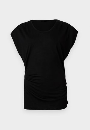 Top corto nero a maniche corte con scollo rotondo. Presenta un tessuto morbido e elasticizzato con arricciature laterali per un look aderente. Texture liscia, forma rilassata.