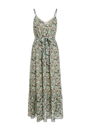 Robe maxi sans manches avec fines bretelles, col en V, ceinture à la taille, et motif abstrait de feuilles vertes, beiges et noires sur tissu léger.