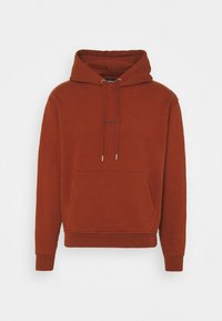 Rostfärgad hoodie i bomullsblandat tyg, med framficka, justerbar huva med dragsko samt ribbstickade mudd och fåll.