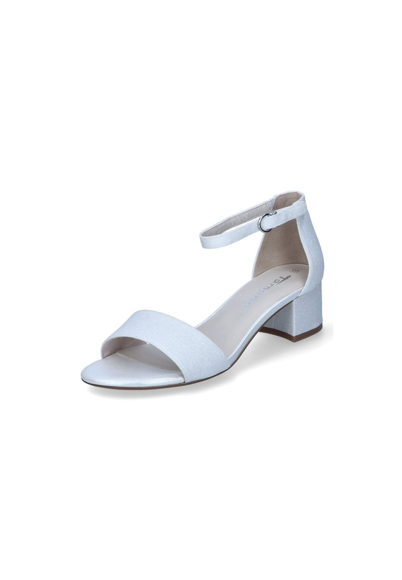White heeled sandal featuring a glossy finish, open toe design, wide front strap, and a delicate ankle strap with a buckle on a block heel.