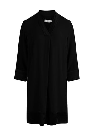 Melna tunika ar V veida kakla izgriezumu un trīs ceturtdaļu piedurknēm, kas izceļas ar gludu tekstūru, sānu krokām un nedaudz garāku aizmugures apdari.