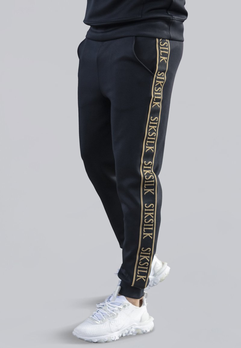 SIKSILK MUSCLE FIT JOGGERS - Tracksuit bottoms - black