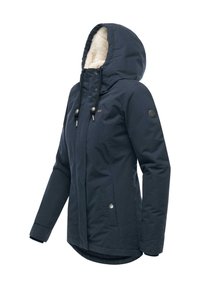 Navy blue winter jacket with a fur-lined hood, zip and snap closures, side pockets, and a slightly longer back hem for coverage.