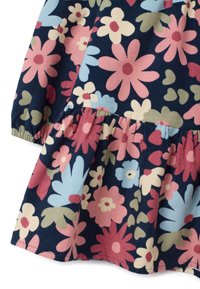 Marineblaue, blumengemusterte Stoff mit rosa, hellblauen und grünen Blumen; verfügt über einen Rüschen Saum und strukturiertes Cord-Material.