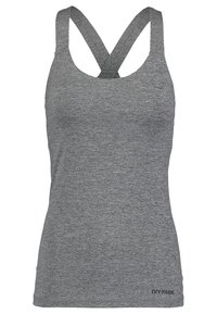 Grå sportig linne med rygkorsdesign, slät textur och subtil melerad mönstring. Har en liten "IVY PARK"-logotyp vid fållen.