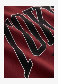 Unselected, berry red varsity