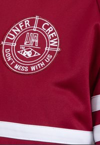 UNFAIR ATHLETICS Majica s kapuljačom i patentnim zatvaračem - burgundy