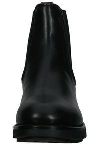 Botte de cheville noire en cuir avec une finition lisse, panneaux latéraux en élastique, bout arrondi et semelle solide. Design minimaliste, sans quincaillerie visible.