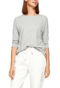 Gray lightweight long-sleeve top with a crew neckline, relaxed fit, and rolled cuffs, paired with textured white drawstring pants.
