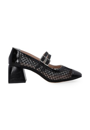 Black heeled shoe with a pointed toe, featuring a mesh design and two decorative straps with buckle accents. Smooth, shiny heel.