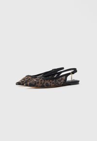 Pointed-toe flat slingback shoes with brown and black leopard print and black trim on a white background.
