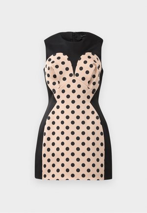 Sleeveless fitted dress featuring black polka dots on a peach background, with black sides and a sweetheart neckline design. Back zipper closure.