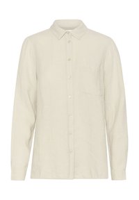 Lyse beige linnedragt med lange ærmer, knappet front, klassisk krave og en enkelt brystlomme. Blød tekstur med en afslappet pasform.