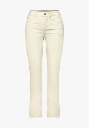 Vaqueros ajustados color blanco roto con botón y cremallera delanteros, diseño de cinco bolsillos y tejido con ligero estiramiento.