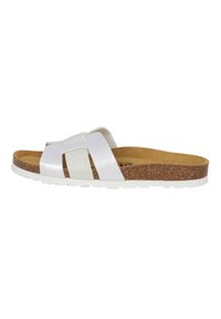 Sandale blanche à glissière avec des brides texturées et une semelle intérieure en liège. Présente une semelle extérieure en caoutchouc légère et un design minimaliste.