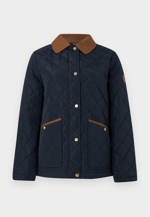 Tengerészkék steppelt kabát barna kordbársony gallérral, aranyszínű fémes díszítéssel és két elülső zsebbel, barnás paszpól részletekkel.