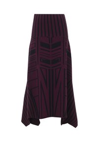 Falda de punto en tonos marrón y negro con llamativos patrones geométricos y cintura alta. El dobladillo es asimétrico y presenta una silueta fluida.