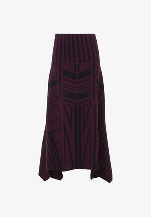 Maroon and black knitted skirt featuring bold geometric patterns and a high waist. Hem is asymmetrical with a flowing silhouette.
