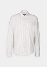 Kevyt harmaa nappipaita valkoisilla raidoilla, jossa on pitkät hihat, kaulus ja rintatasku. Valmistettu sileästä kankaasta.